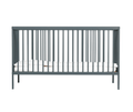 Cotbed with toddler safety rail